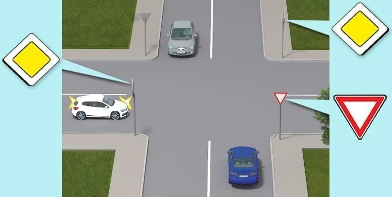 Ілюстрація до питання: Білий автомобіль проїде дане перехрестя: