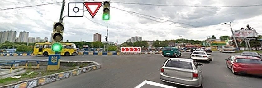 Ілюстрація до питання: Водій сірого автомобіля здійснює в’їзд на перехрестя з круговим рухом. Чи потрібно в такому випадку вмикати лівий…